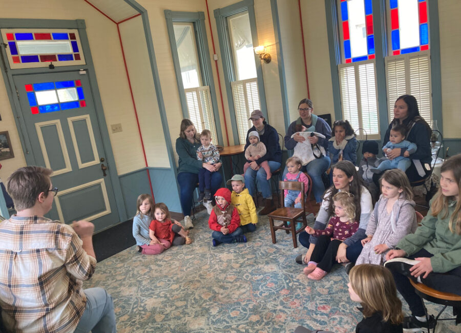 Friday Story Hours in partnership with Hayner Library are very popular with Ms. Mary Kay.